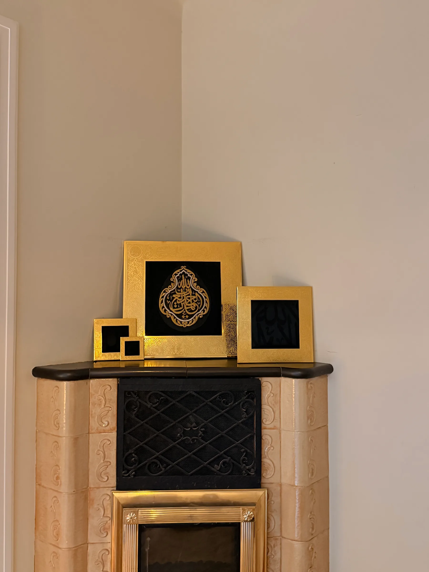 All four Kiswah frame sizes arranged together on a fireplace